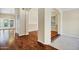 Open living space featuring hardwood floors and arched doorways at 1975 E Chilton Dr, Tempe, AZ 85283