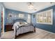 Bright bedroom with hardwood floors and large windows that provide plenty of natural light at 19858 W San Juan Ave, Litchfield Park, AZ 85340
