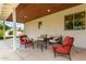 Covered back patio with comfortable seating offering a relaxing outdoor space at 2242 E Palm Ln, Phoenix, AZ 85006