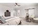 Relaxing bedroom with a modern bed, a sliding closet door, and a clear view to the en suite bathroom at 2242 E Palm Ln, Phoenix, AZ 85006