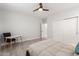 Bedroom featuring neutral tones, natural light, and ample closet space at 2242 E Palm Ln, Phoenix, AZ 85006