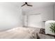 Bedroom featuring neutral tones, natural light, and ample closet space at 2242 E Palm Ln, Phoenix, AZ 85006