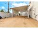 Large carport providing covered parking and storage space with a gated wall and easy access to the property at 2242 E Palm Ln, Phoenix, AZ 85006