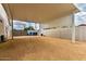 Wide carport with ample space for parking and storage, providing convenience and protection from the elements at 2242 E Palm Ln, Phoenix, AZ 85006