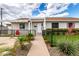 Charming home exterior with a manicured lawn, inviting front entrance, and well-maintained landscaping at 2242 E Palm Ln, Phoenix, AZ 85006