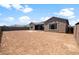 Expansive backyard with room for customization and outdoor enjoyment, perfect for creating your dream outdoor oasis at 22523 E Orchard Ln, Queen Creek, AZ 85142
