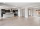 Spacious kitchen with stainless steel appliances, white countertops, and dark cabinets at 22523 E Orchard Ln, Queen Creek, AZ 85142