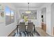 Bright dining room featuring neutral colors, tile floors, and lots of natural light at 23077 S 214Th St, Queen Creek, AZ 85142