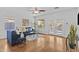 Bright living room with hardwood floors, lots of light, and stylish decor at 23077 S 214Th St, Queen Creek, AZ 85142