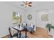 Bright sitting area with hardwood floors and blue furniture creating a cozy, inviting space at 23077 S 214Th St, Queen Creek, AZ 85142