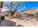Driveway shows desert landscaping with view of mountains in the background at 3505 E South Fork Dr, Phoenix, AZ 85044