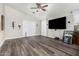 Open living room showcasing new flooring, vaulted ceilings, and access to the backyard at 36480 W El Greco St, Maricopa, AZ 85138
