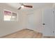 Minimalist bedroom featuring neutral tones, and closet for storage at 3826 W Davidson Ln, Phoenix, AZ 85051