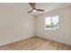 Bright bedroom featuring neutral tones and a window that provides natural light at 3826 W Davidson Ln, Phoenix, AZ 85051