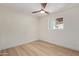 Minimalist bedroom featuring neutral tones and a window that provides natural light at 3826 W Davidson Ln, Phoenix, AZ 85051