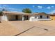 Cozy single-story home with a covered carport and xeriscaped front yard in a vibrant neighborhood at 3826 W Davidson Ln, Phoenix, AZ 85051