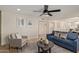 Bright living room featuring modern furnishings and an open layout, ideal for entertaining and relaxation at 3826 W Davidson Ln, Phoenix, AZ 85051