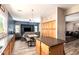 Open concept living area connecting the kitchen with living room and entertainment center at 4667 E County Down Dr, Chandler, AZ 85249