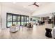 Bright, open living room with vaulted ceilings, modern furnishings, and views of pool and outdoor space at 5111 E Cortez Dr, Scottsdale, AZ 85254