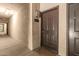 Apartment doorway in a hallway, featuring unit number 2015 and an exit sign at 5302 E Van Buren St # 2015, Phoenix, AZ 85008