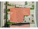 Aerial top-down view of home with beautiful desert landscaping, terracotta tile roof and privacy hedges at 5332 S Citrus Ct, Gilbert, AZ 85298
