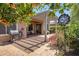 Backyard with covered patio, tile flooring, grill, and citrus trees with orange fruit at 5332 S Citrus Ct, Gilbert, AZ 85298