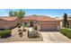 Charming single-story home with a well-maintained front yard featuring desert landscaping and a cozy covered entryway at 5332 S Citrus Ct, Gilbert, AZ 85298