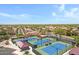 A view of tennis courts within a residential area, offering recreational amenities and community engagement at 5332 S Citrus Ct, Gilbert, AZ 85298