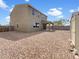 Low maintenance backyard with gravel, patio, and shed, perfect for relaxing and outdoor entertaining at 7146 E Bobwhite Ct, San Tan Valley, AZ 85143