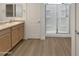 Functional bathroom features dual sinks, a vanity, and a walk-in shower for comfortable, everyday use at 7146 E Bobwhite Ct, San Tan Valley, AZ 85143