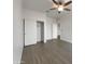 Bedroom with a ceiling fan, closet, and neutral color palette, perfect for relaxation at 7146 E Bobwhite Ct, San Tan Valley, AZ 85143
