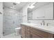 Bathroom includes marble tiled glass shower, double sink vanity with modern fixtures and a skylight at 7648 N Via Del Paraiso --, Scottsdale, AZ 85258