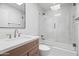 Bathroom includes a skylight, glass shower, modern vanity, and brushed nickel fixtures at 7648 N Via Del Paraiso --, Scottsdale, AZ 85258
