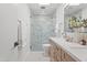 Bathroom with a glass walk-in shower and wood-finished vanity at 7648 N Via Del Paraiso --, Scottsdale, AZ 85258