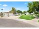 Lovely home featuring a manicured front lawn, desert plants and a two car garage at 7648 N Via Del Paraiso --, Scottsdale, AZ 85258