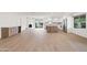 Open-concept kitchen with white cabinetry, stainless steel appliances, and a spacious center island at 7648 N Via Del Paraiso --, Scottsdale, AZ 85258