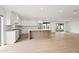 Bright kitchen boasts a center island, stainless appliances, and ample counter space at 7648 N Via Del Paraiso --, Scottsdale, AZ 85258