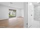 This spacious main bedroom has hardwood floors, slider door to backyard, and bathroom with a glass shower at 7648 N Via Del Paraiso --, Scottsdale, AZ 85258