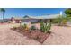 Single story home with desert landscaping at 8020 W Windrose Dr, Peoria, AZ 85381