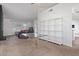 Bright living room with a fireplace and neutral tones, filled with natural light at 8020 W Windrose Dr, Peoria, AZ 85381