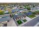 Expansive aerial view of a well-maintained home with a pool, artificial turf, and manicured landscaping at 8117 E Lewis Ave, Scottsdale, AZ 85257
