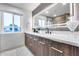 Modern bathroom features double sinks, stylish lighting and ample counter space at 8117 E Lewis Ave, Scottsdale, AZ 85257