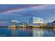Waterfront commercial buildings with modern architecture, surrounded by serene water features at 8117 E Lewis Ave, Scottsdale, AZ 85257