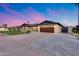 Charming single-Gathering home featuring a well manicured lawn and a 2 car garage at 8117 E Lewis Ave, Scottsdale, AZ 85257