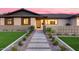 Inviting front entrance with a decorative fence, leading to a modern style front door at 8117 E Lewis Ave, Scottsdale, AZ 85257