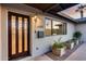 Front entrance with a decorative lighting fixture and mailbox at 8117 E Lewis Ave, Scottsdale, AZ 85257