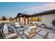Outdoor patio with furniture and decorative rock at 8117 E Lewis Ave, Scottsdale, AZ 85257