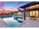 Backyard pool with patio and outdoor dining area, perfect for entertaining and relaxing at 8117 E Lewis Ave, Scottsdale, AZ 85257