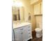 Updated bathroom featuring a marble countertop vanity and modern fixtures at 930 W Mackenzie Dr, Phoenix, AZ 85013