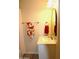 Bathroom sink with bright vanity top and mirror, and neutral paint at 930 W Mackenzie Dr, Phoenix, AZ 85013